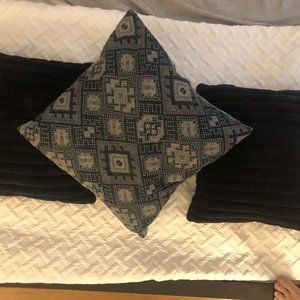 CB2 Navy velvet and accent patterned pillows